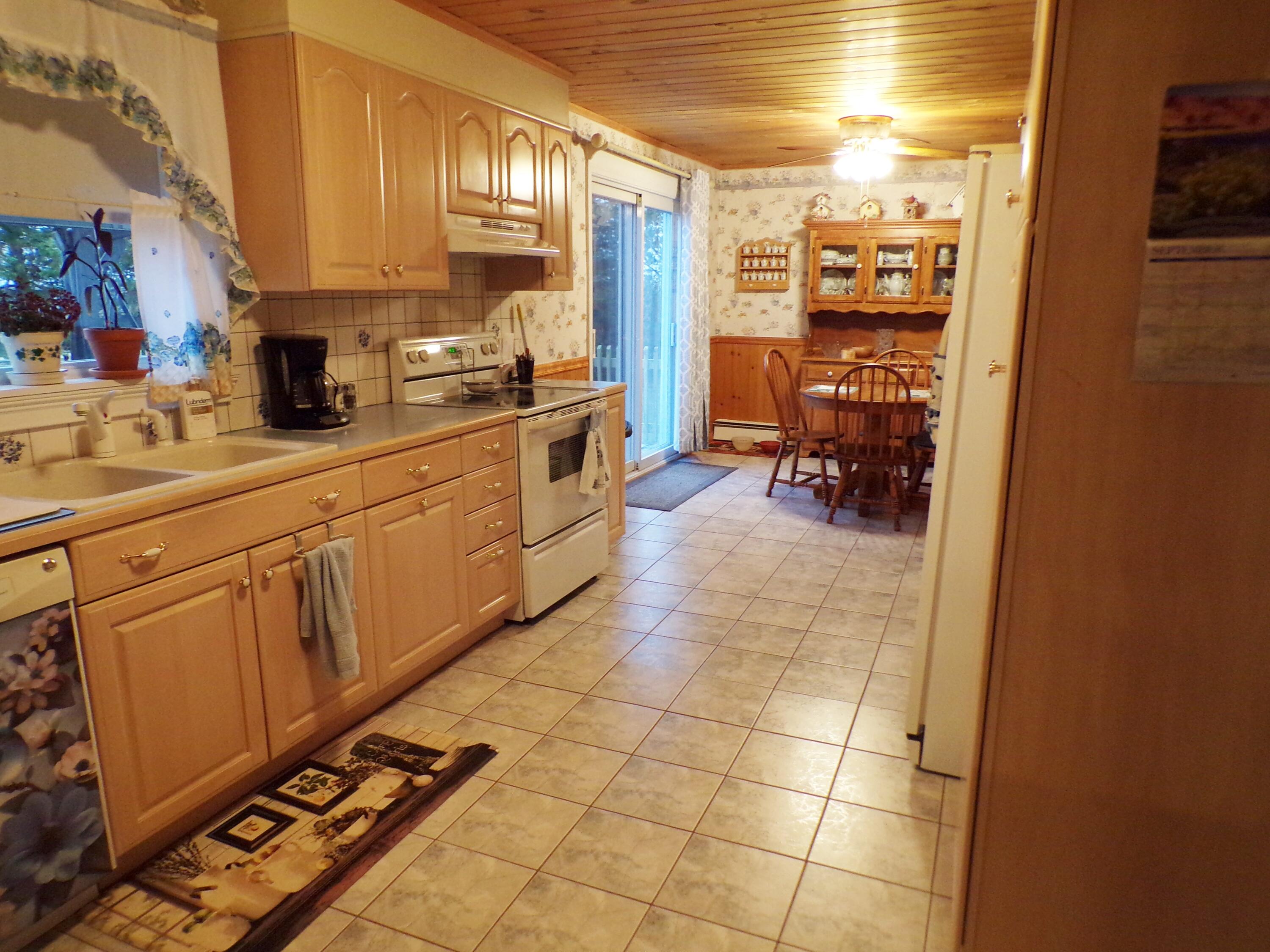 470 Caribou Road Presque Isle, ME 04769 - Photo 3 of 71 Kitchen is very long and very nice.