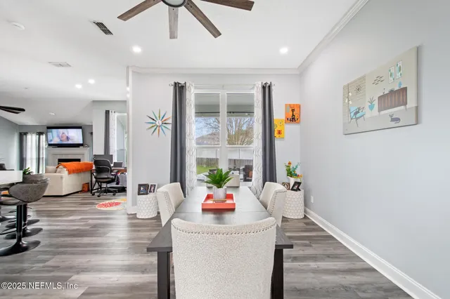 a living room with furniture and window