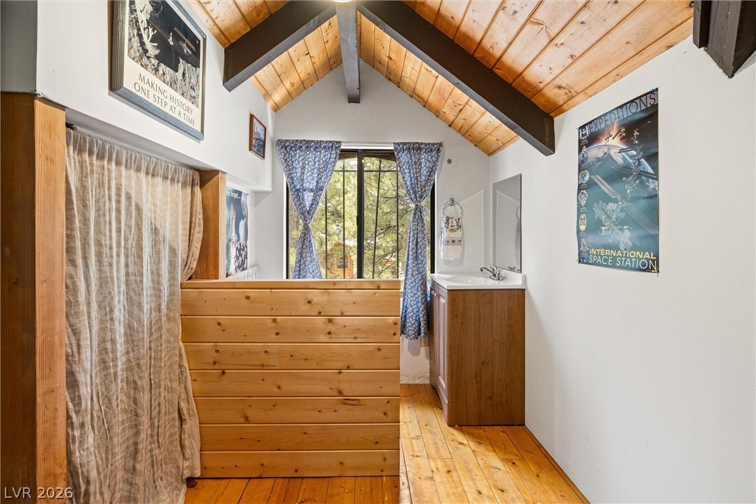 2146 Via Spes Nostra Street Mount Charleston, NV 89124 - Photo 28 of 33 Natural wood flooring and vaulted ceilings create a warm, inviting atmosphere.