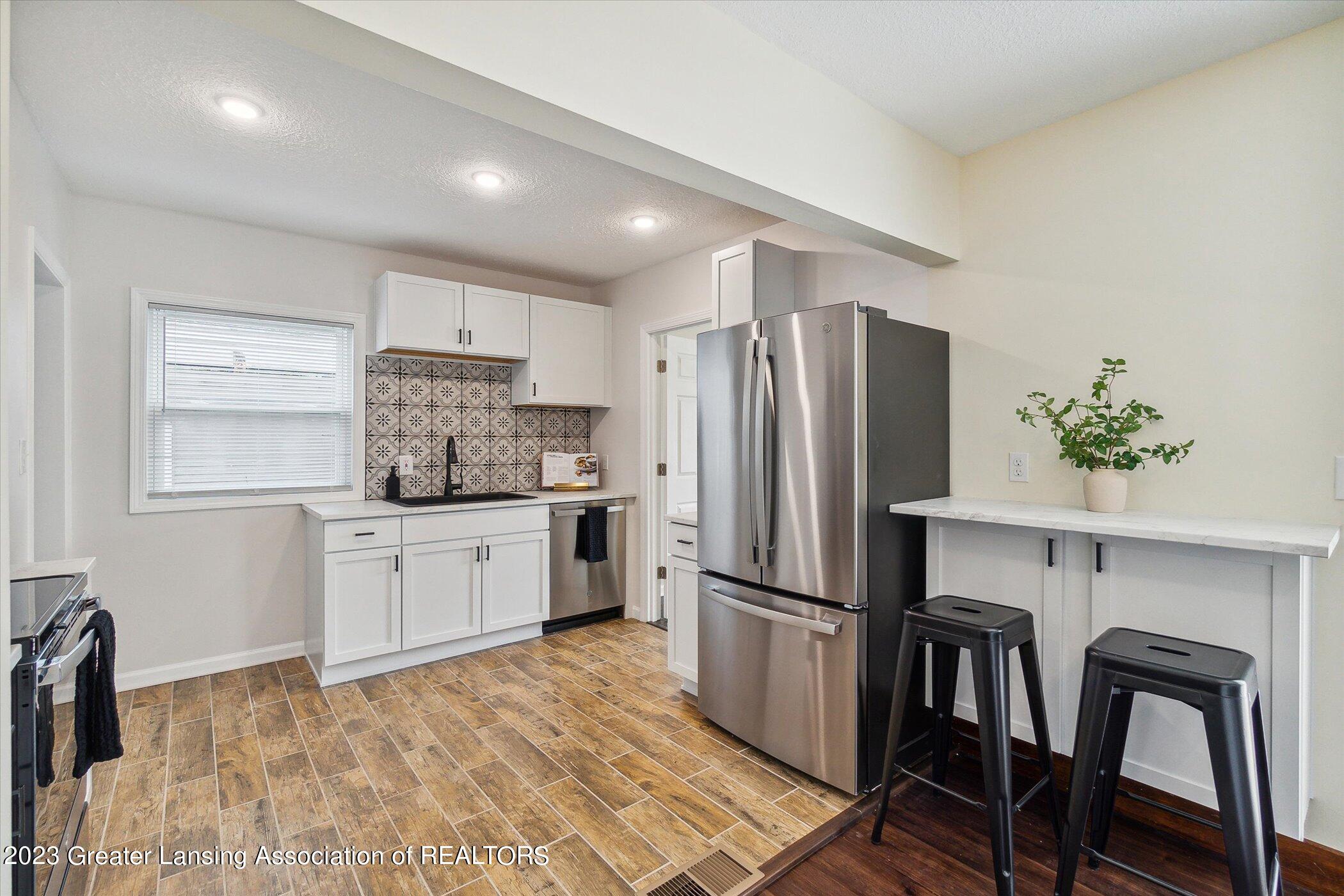 1509 Osborn Road Lansing, MI 48915 - Photo 9 of 33 11-1509-Osborn-Rd-Lansing-MI-48915-Windo