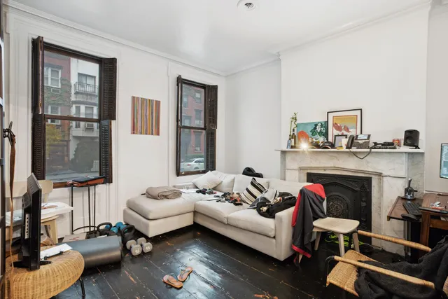 a bedroom with furniture and a couch