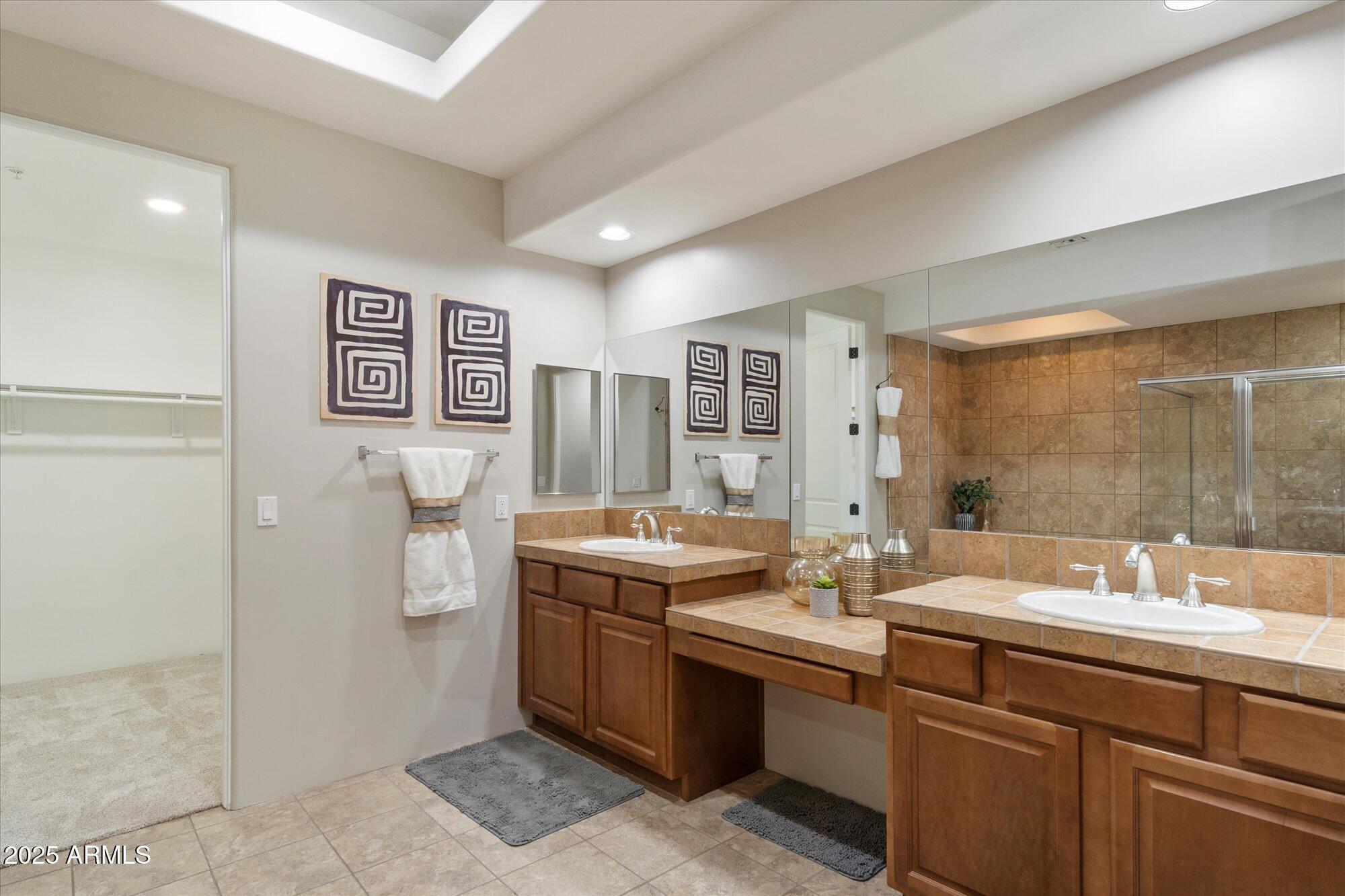 7200 East Ridgeview Place, Unit 9 Carefree, AZ 85377 - Photo 18 of 29 a room with a sink storage and utility