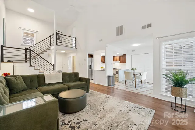 a living room with furniture and a couch