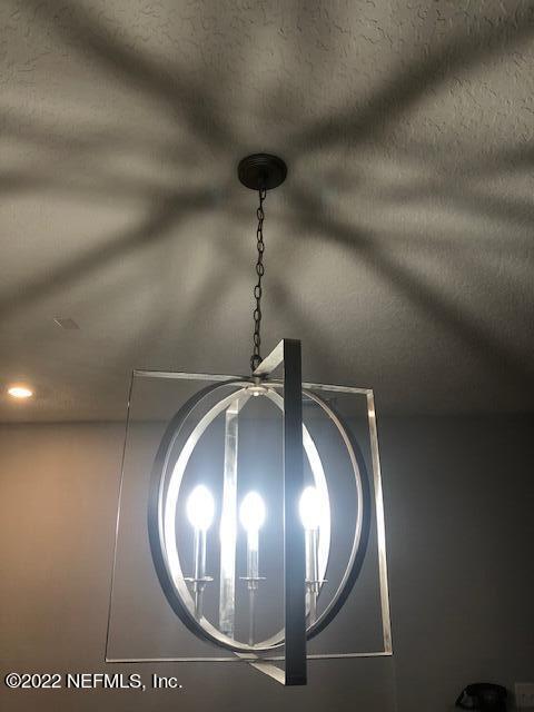 8220 Fouraker Forest Road Jacksonville, FL 32221 - Photo 27 of 56 DINING AREA CEILING FIXTURE
