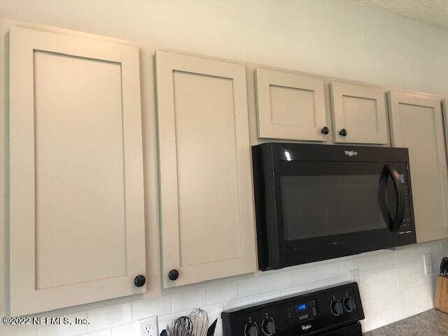 8220 Fouraker Forest Road Jacksonville, FL 32221 - Photo 29 of 56 KITCHEN CABINETS