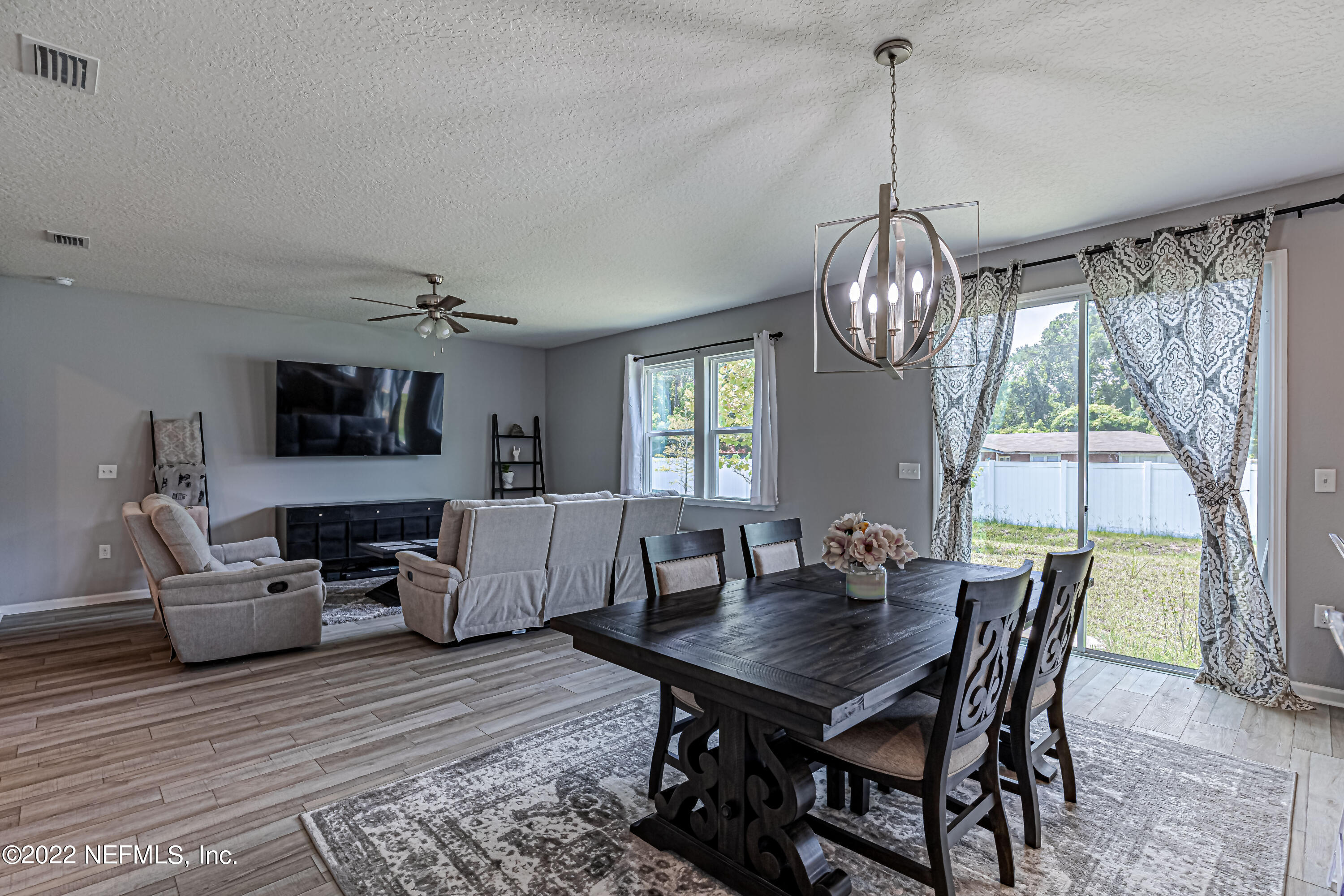 8220 Fouraker Forest Road Jacksonville, FL 32221 - Photo 44 of 56 DINING AREA & SLIDING GLASS DOOR