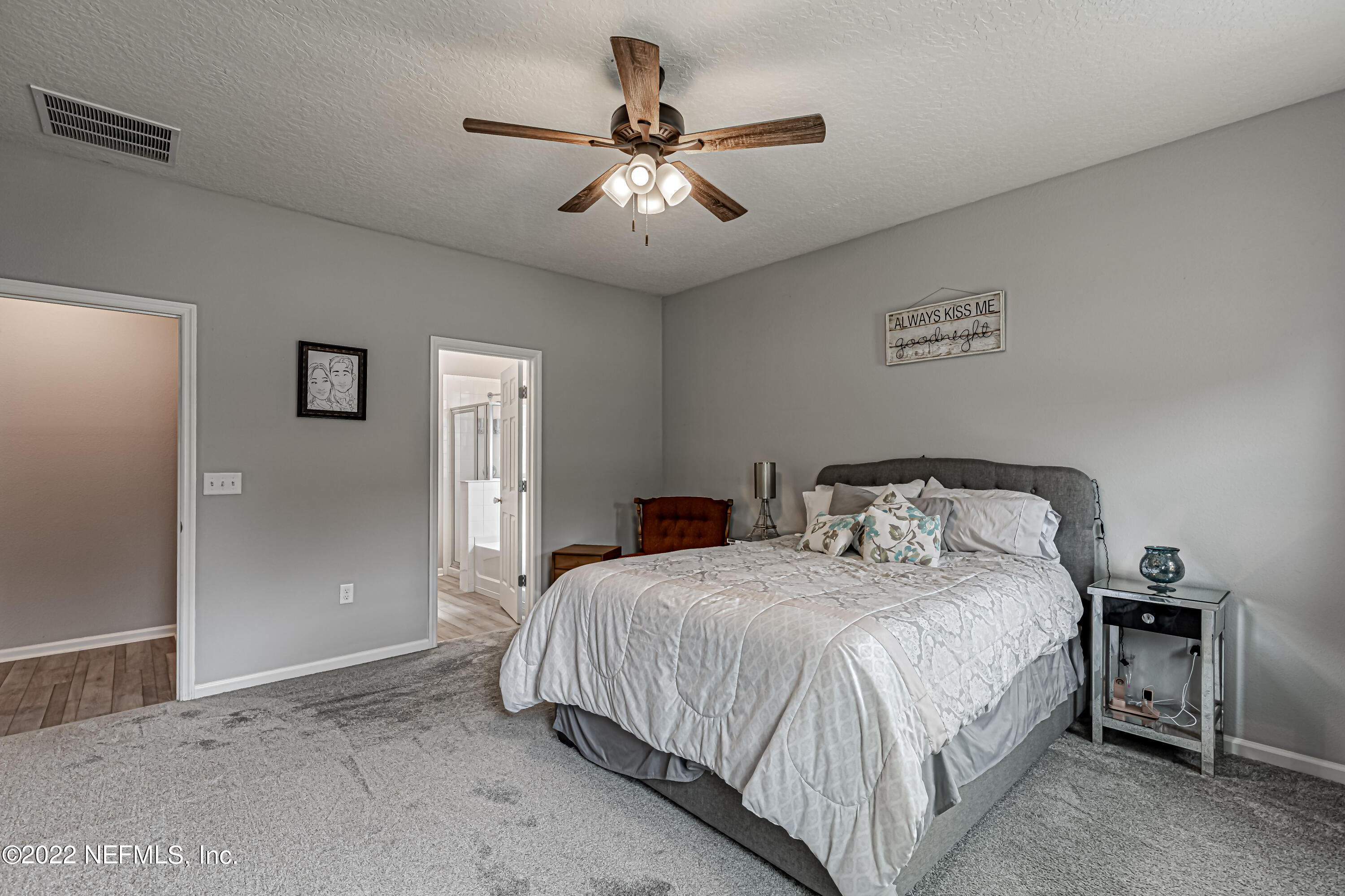 8220 Fouraker Forest Road Jacksonville, FL 32221 - Photo 50 of 56 PRIMARY BEDROOM & BATHROOM ENTRY