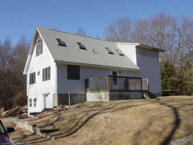 177 Wright Pond Road Canterbury, CT 06331 - Photo 1 of 1 a front view of a house with a yard