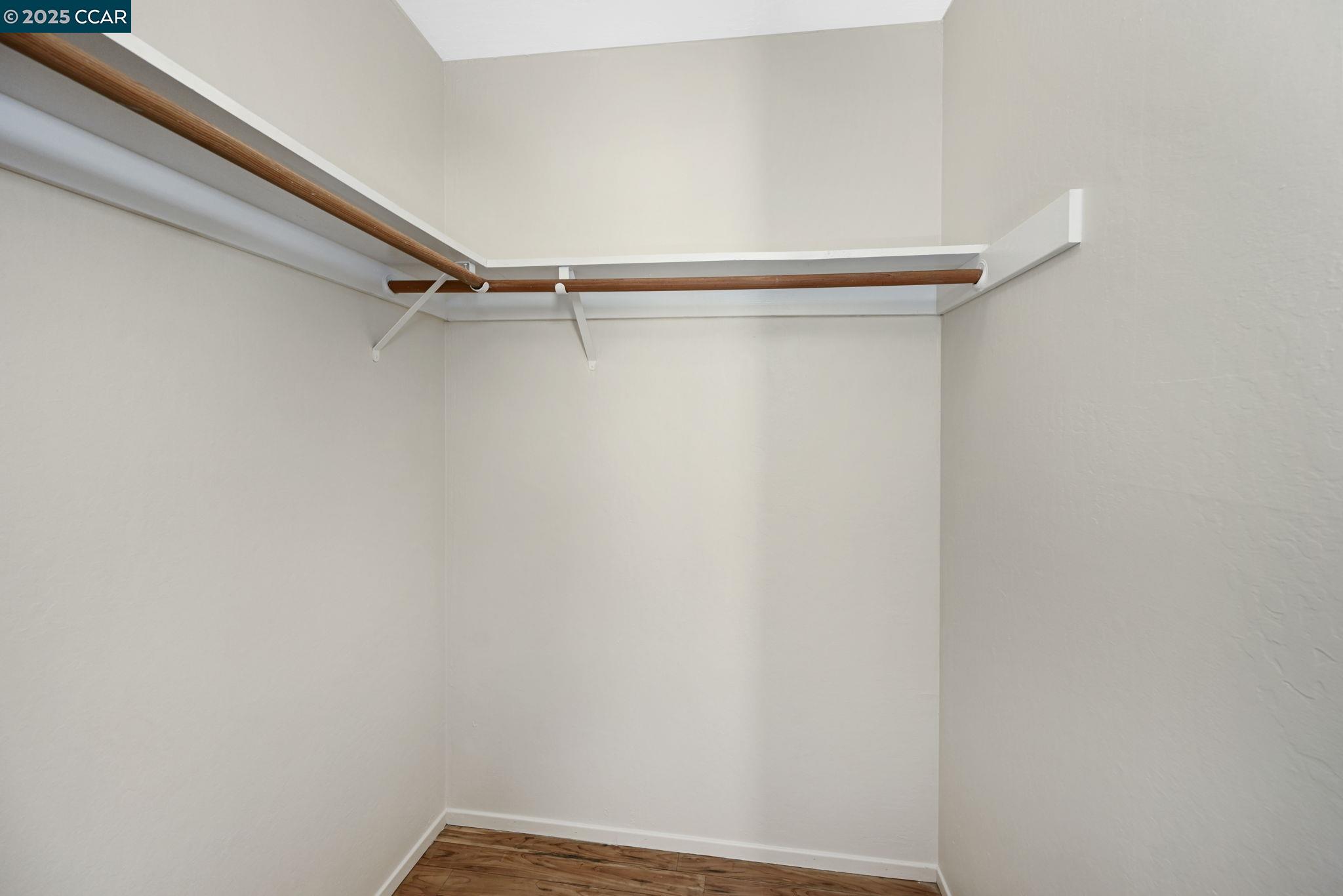 1435 Bel Air Drive, Unit C Concord, CA 94521 - Photo 15 of 25 a view of a room with racks on the wall