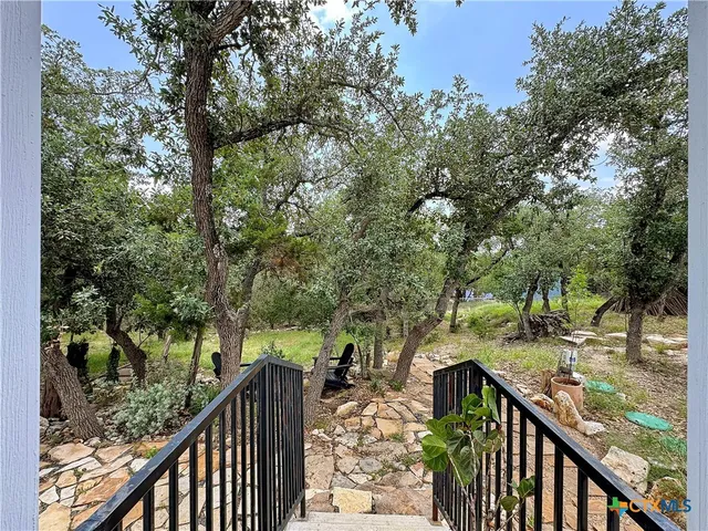 a view of road with snow on the road