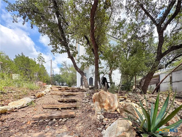 a view of a lake from a window