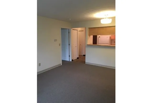 a view of a room with a bathroom