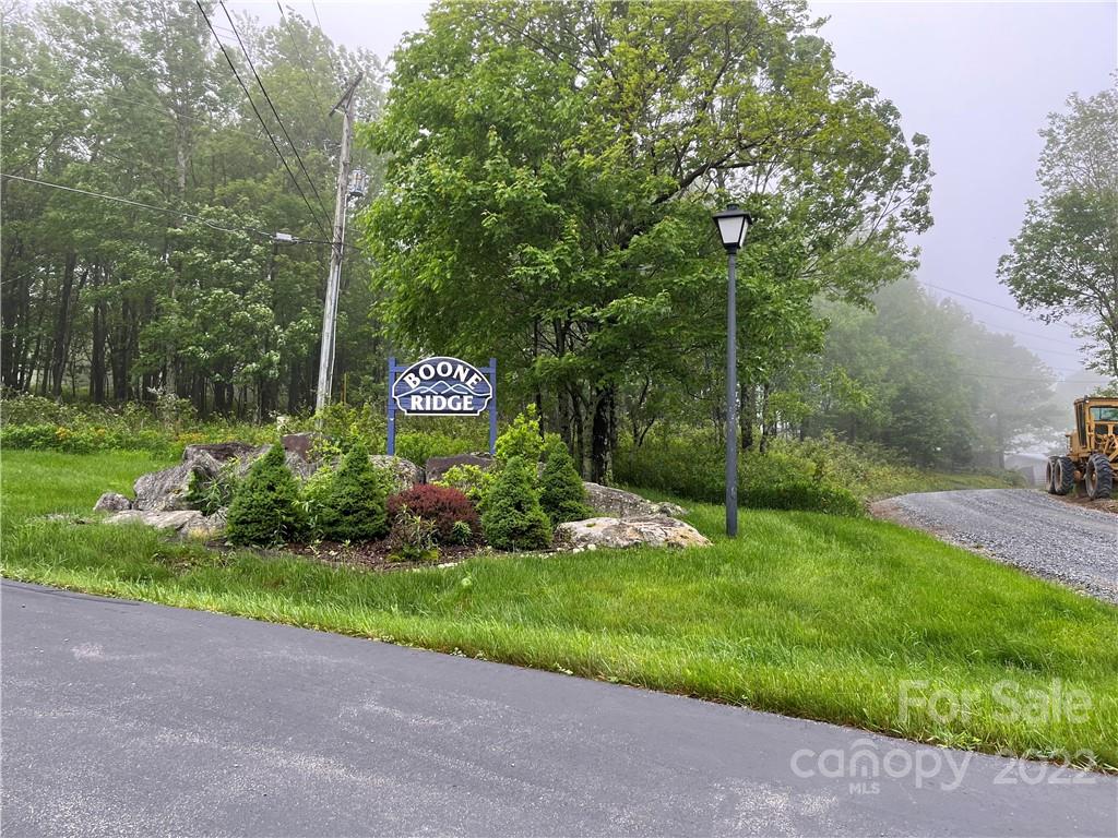 Lot 23 Boone Ridge Lane, Unit LOT 23 Boone, NC 28607 - Photo 1 of 5 a view of a sign board with garden