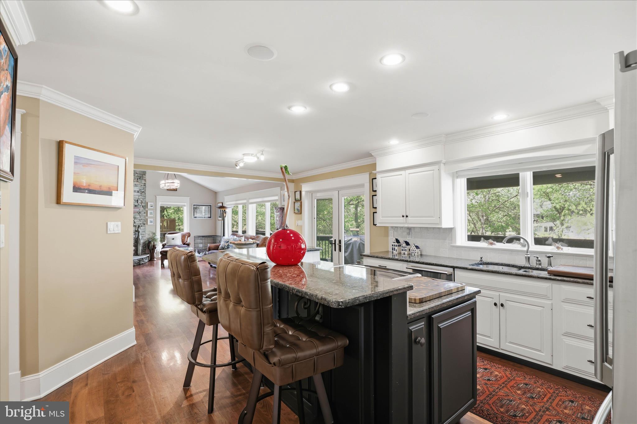 137 East Woods Drive Lititz, PA 17543 - Photo 16 of 64 a kitchen with a table chairs stove and cabinets