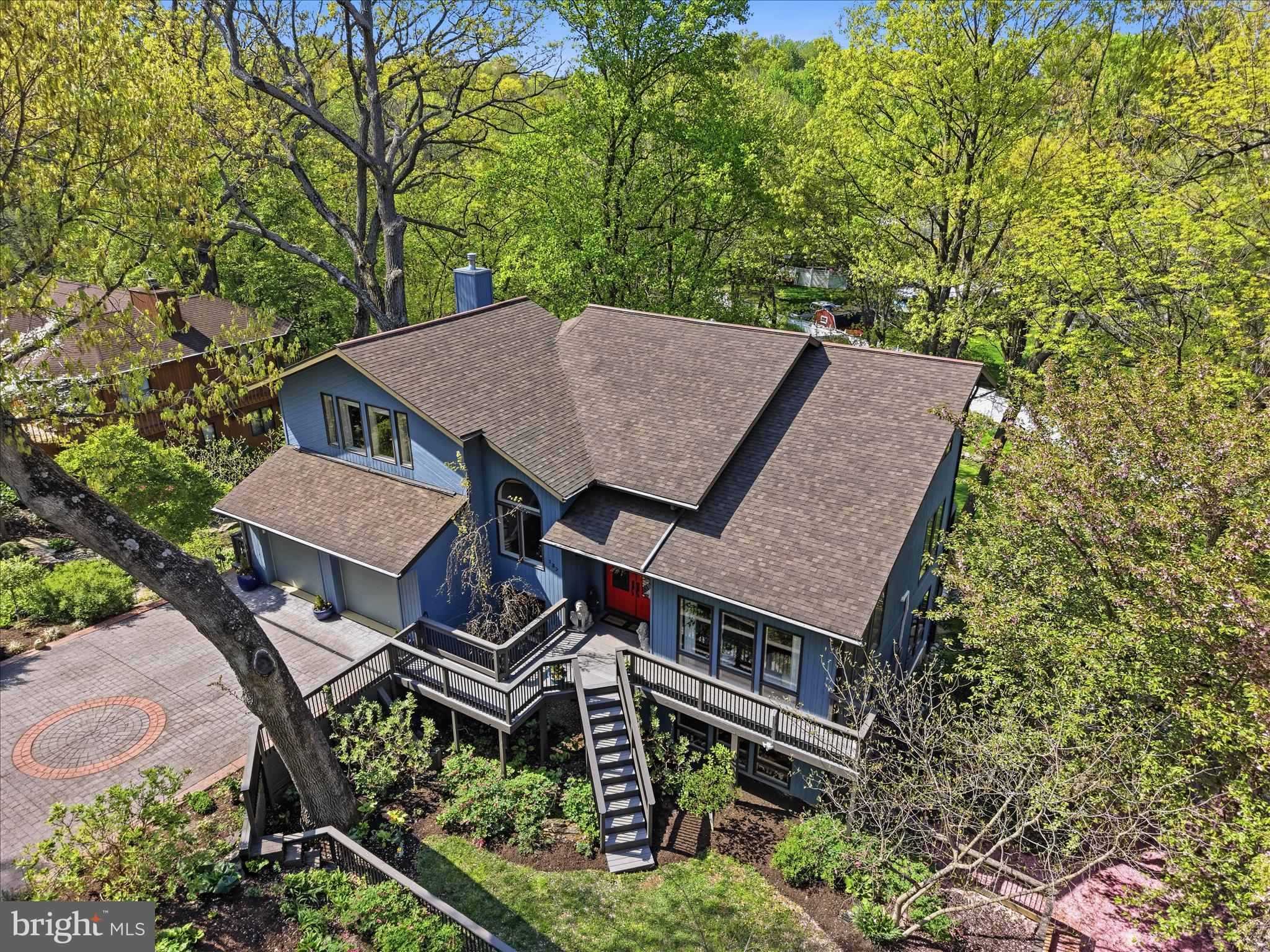 137 East Woods Drive Lititz, PA 17543 - Photo 2 of 64 an aerial view of a house with a yard and sitting area