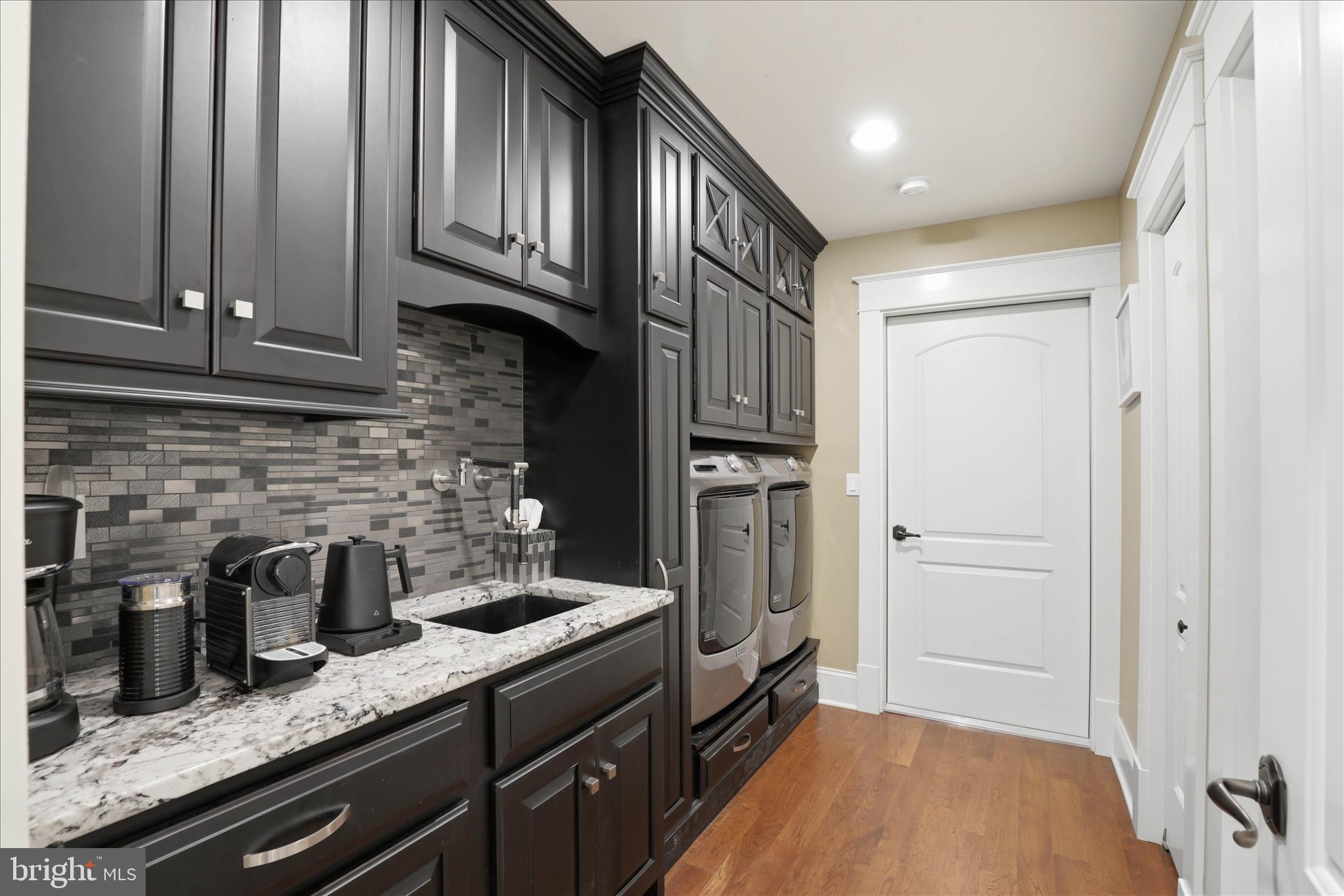 137 East Woods Drive Lititz, PA 17543 - Photo 21 of 64 a kitchen with stainless steel appliances granite countertop a stove a refrigerator and a sink
