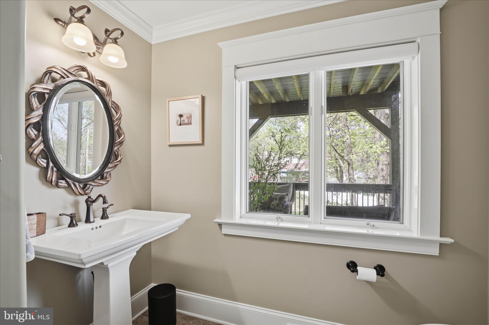 137 East Woods Drive Lititz, PA 17543 - Photo 42 of 64 a bathroom with a sink a mirror and a window