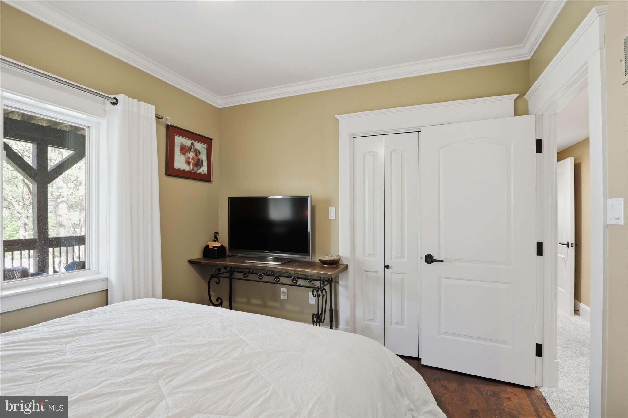 137 East Woods Drive Lititz, PA 17543 - Photo 44 of 64 a bedroom with a bed and a flat screen tv