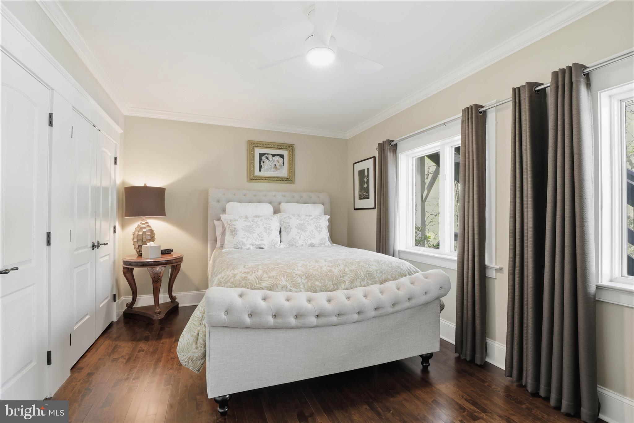 137 East Woods Drive Lititz, PA 17543 - Photo 45 of 64 a spacious bedroom with a bed and wooden floor