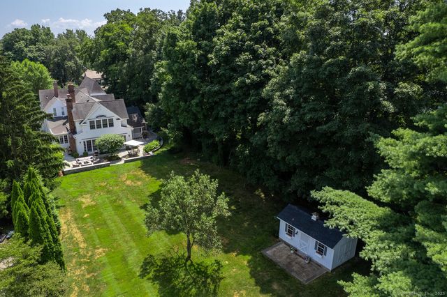 an aerial view of residential house with outdoor space