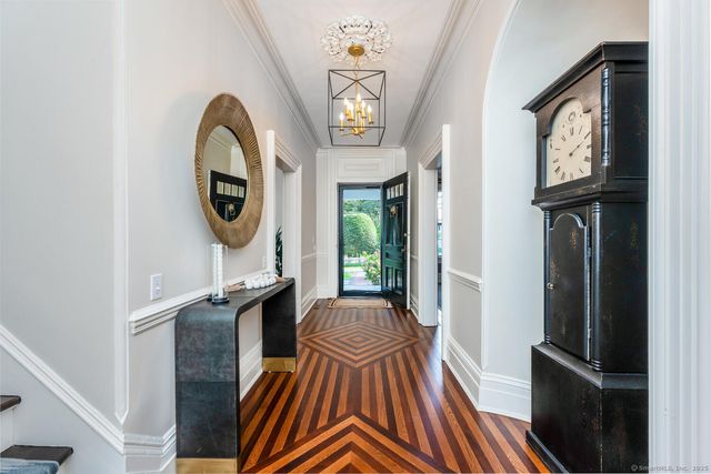 a view of entryway with wooden floor