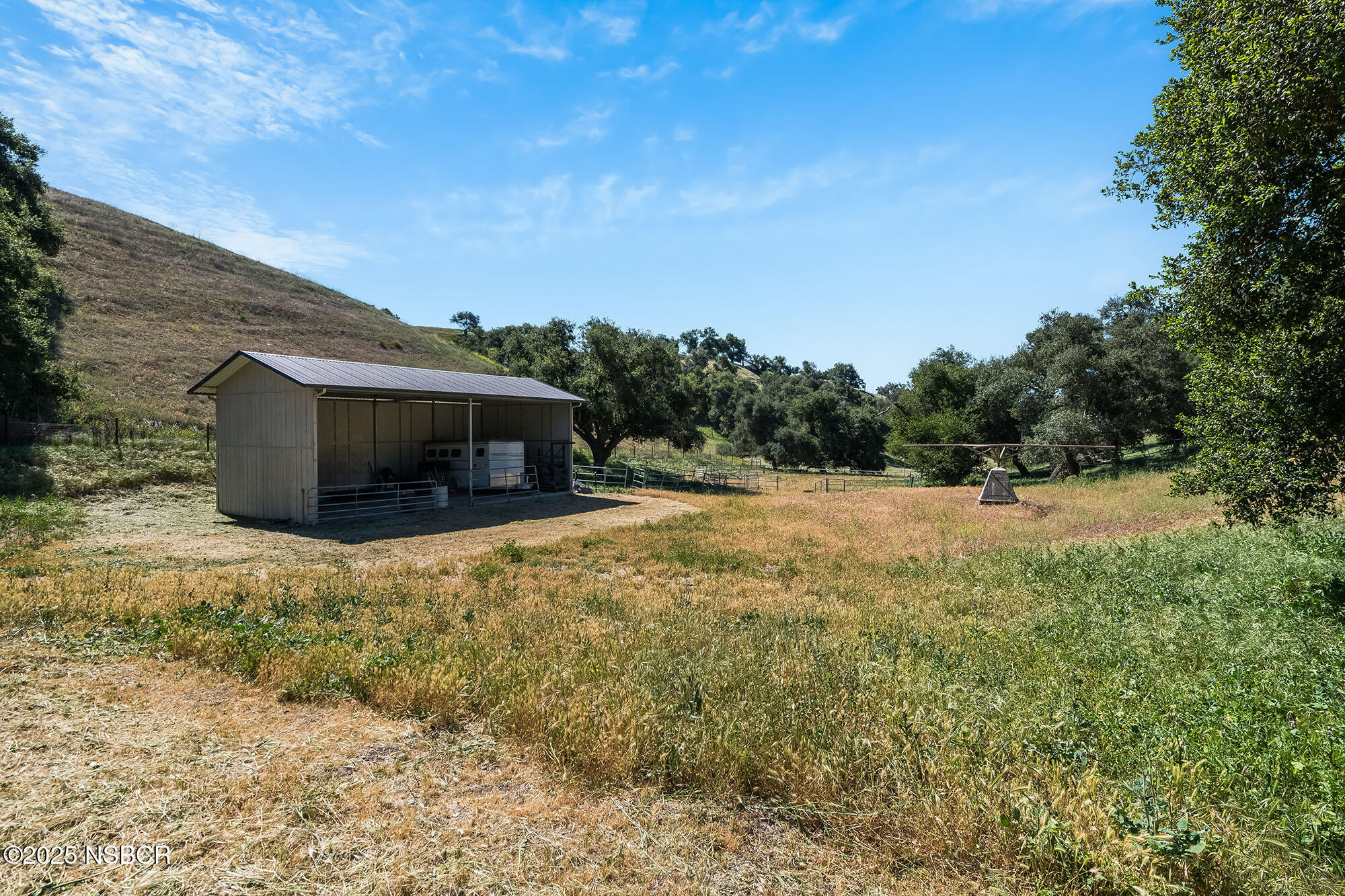 3333-3349 Long Valley Road Santa Ynez, CA 93460 - Photo 35 of 97 a backyard of a house with lots of green space