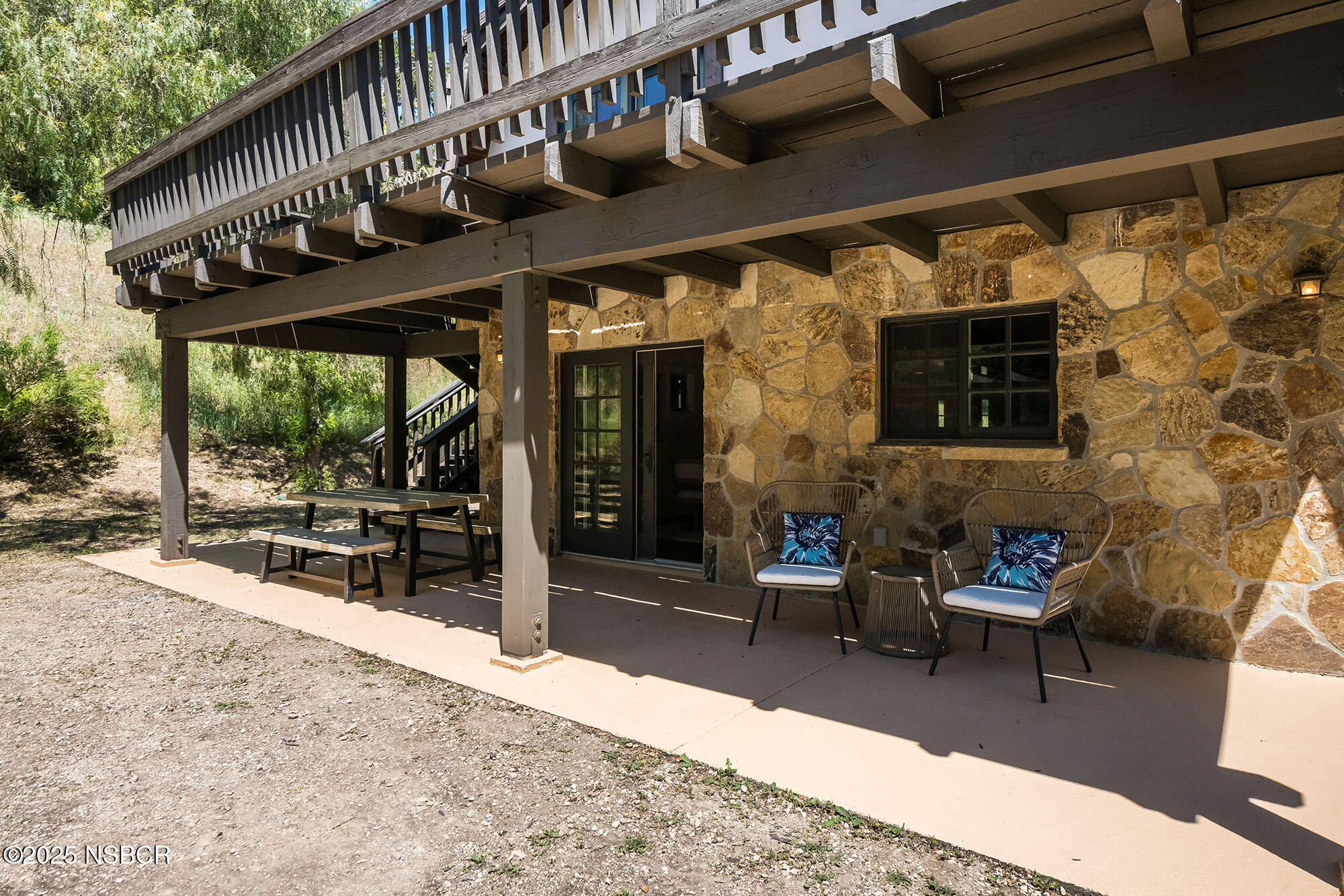 3333-3349 Long Valley Road Santa Ynez, CA 93460 - Photo 62 of 97 a view of an chairs and table in the patio