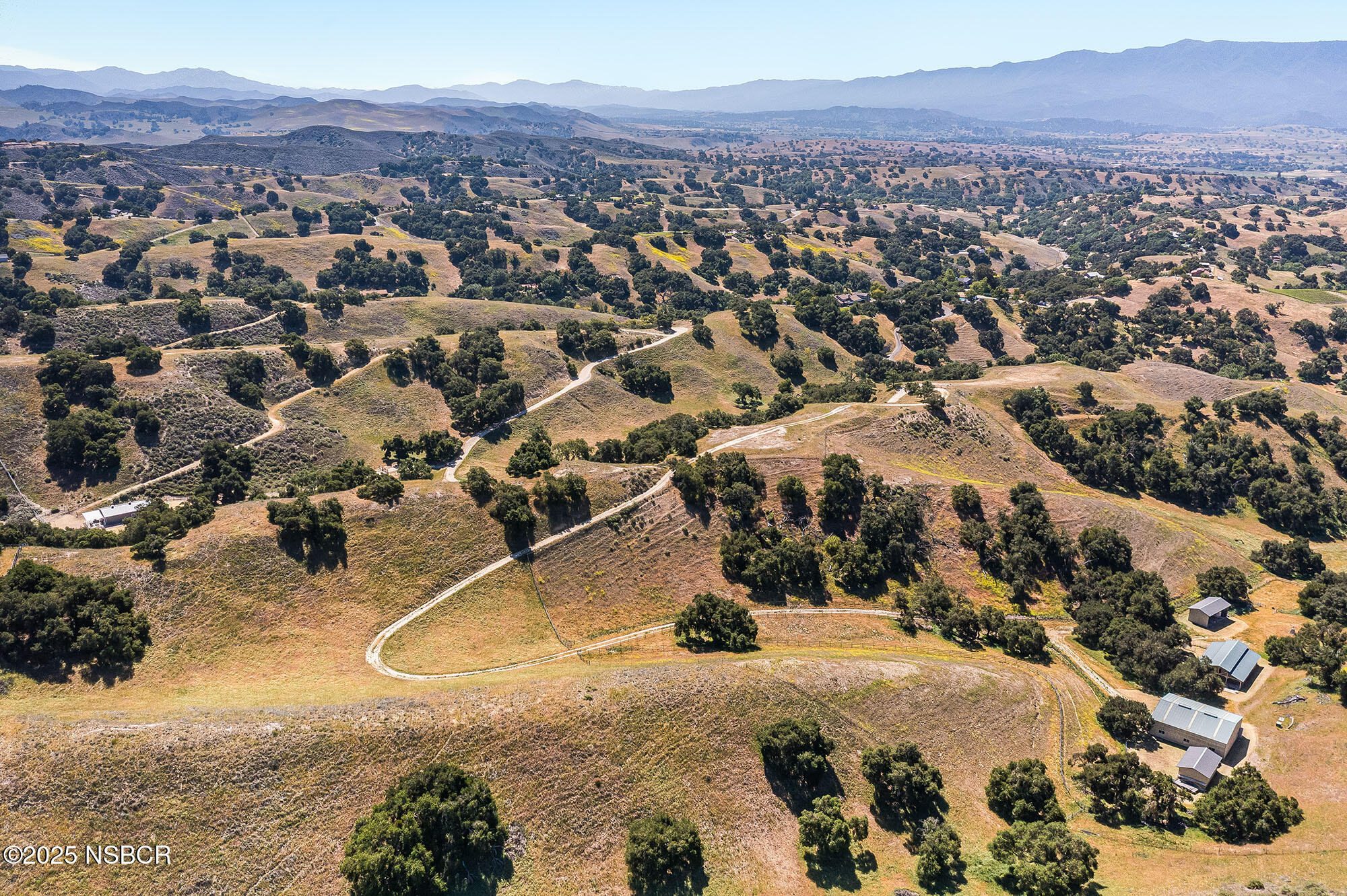3333-3349 Long Valley Road Santa Ynez, CA 93460 - Photo 9 of 97 an aerial view of residential house and sandy dunes