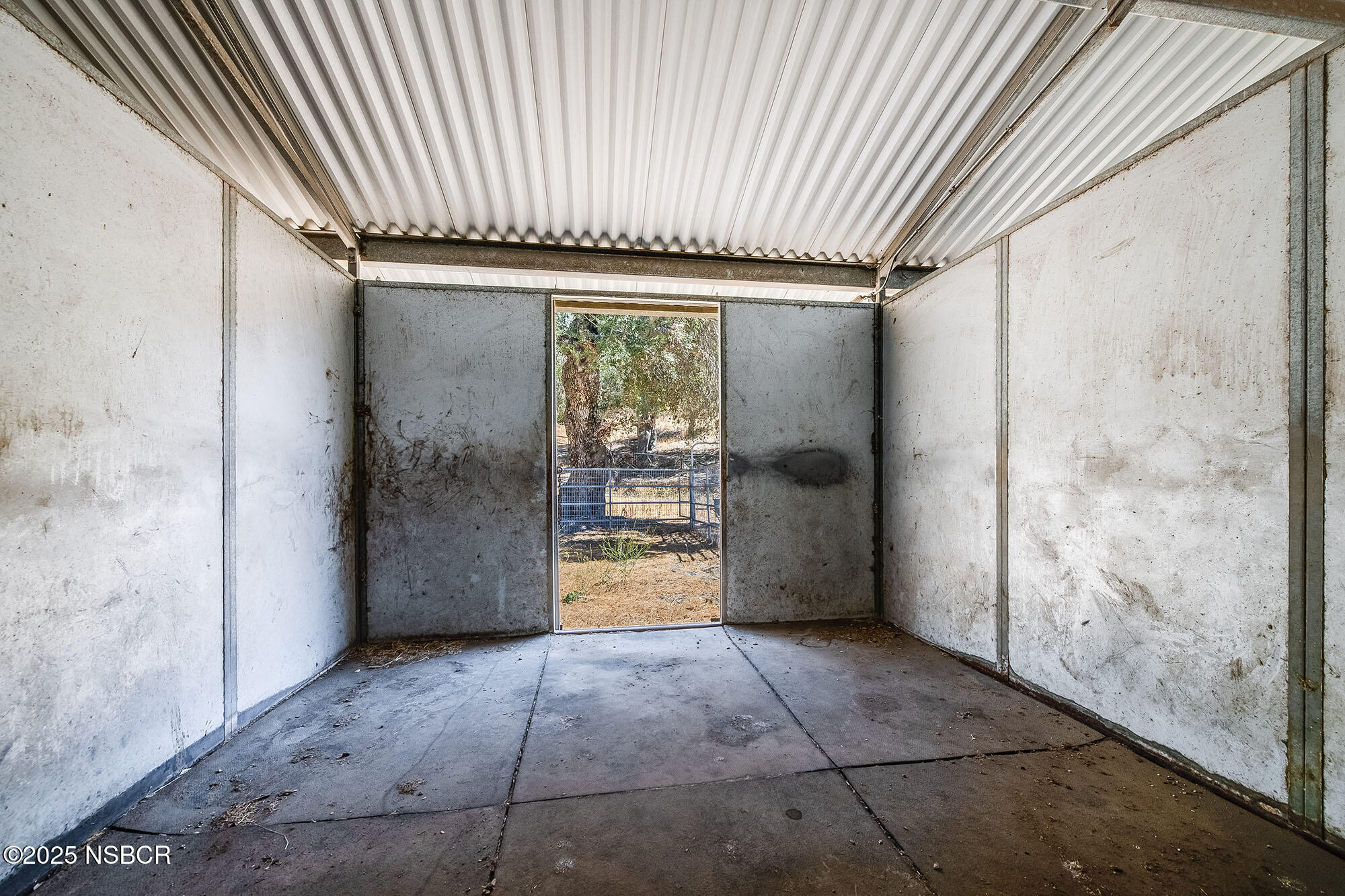 3333-3349 Long Valley Road Santa Ynez, CA 93460 - Photo 96 of 97 a view of an empty room with a fireplace
