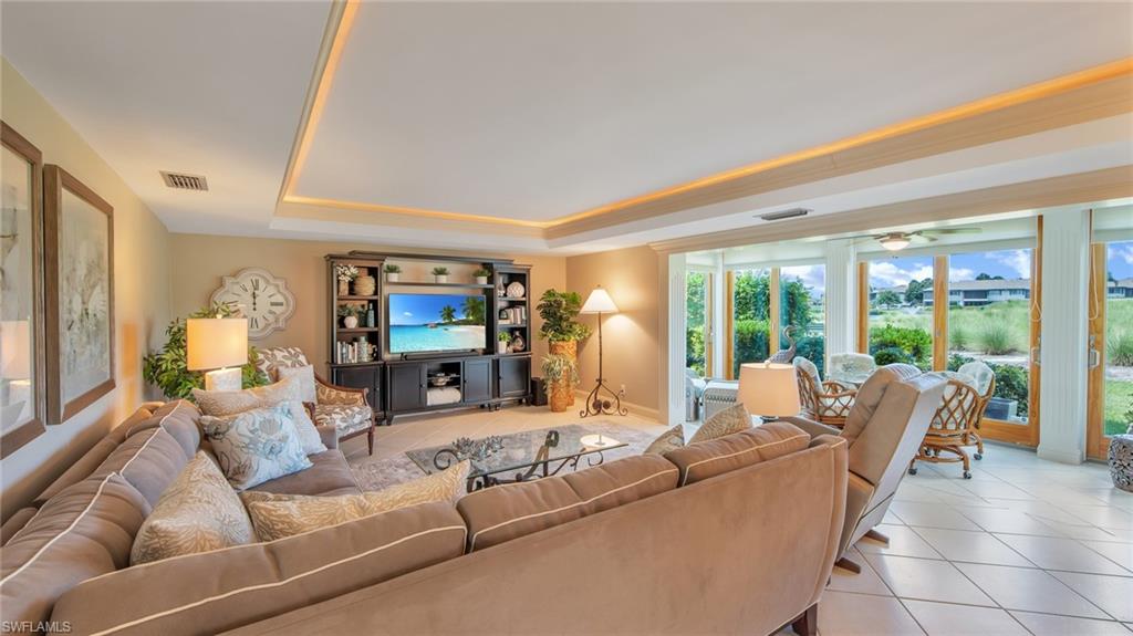 641 Teryl Road, Unit 3 Naples, FL 34112 - Photo 7 of 34 View into living area and lanai