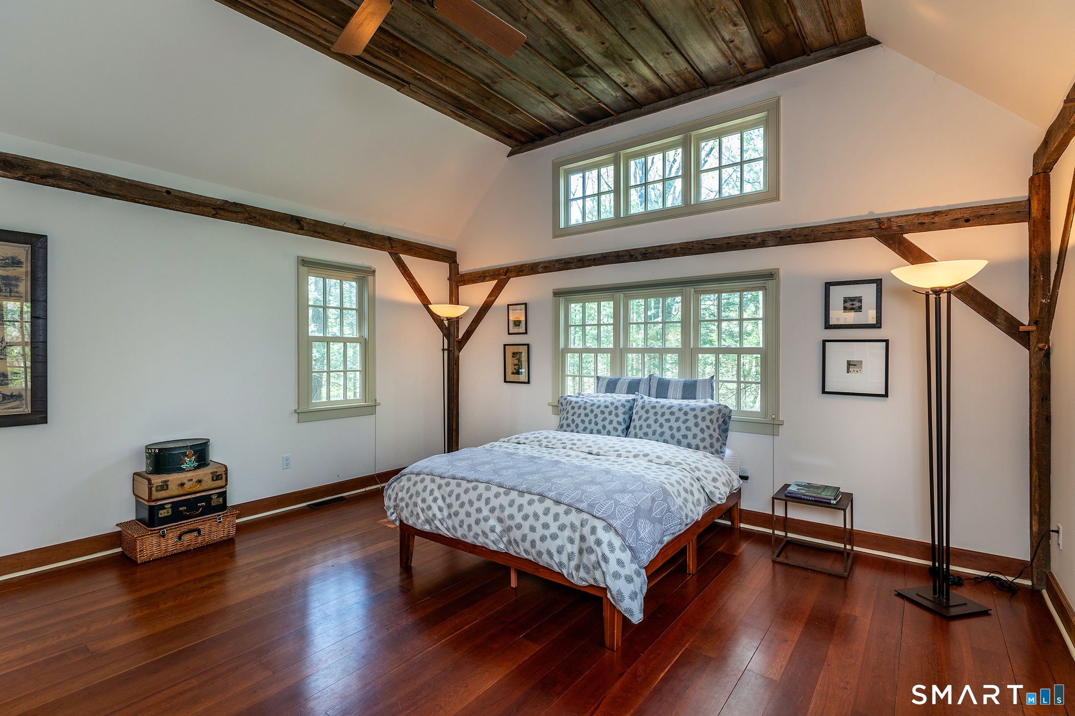 18 Curtis Road Washington, CT 06793 - Photo 15 of 32 Main level family room, barnwood ceiling, cherry floor.