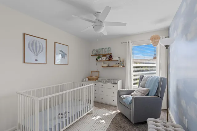 a view of dining room with wooden floor and window