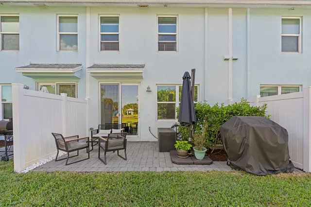 a bathroom with a sink and mirror with toilet