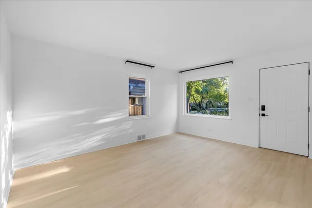 a view of a room that has a window in it