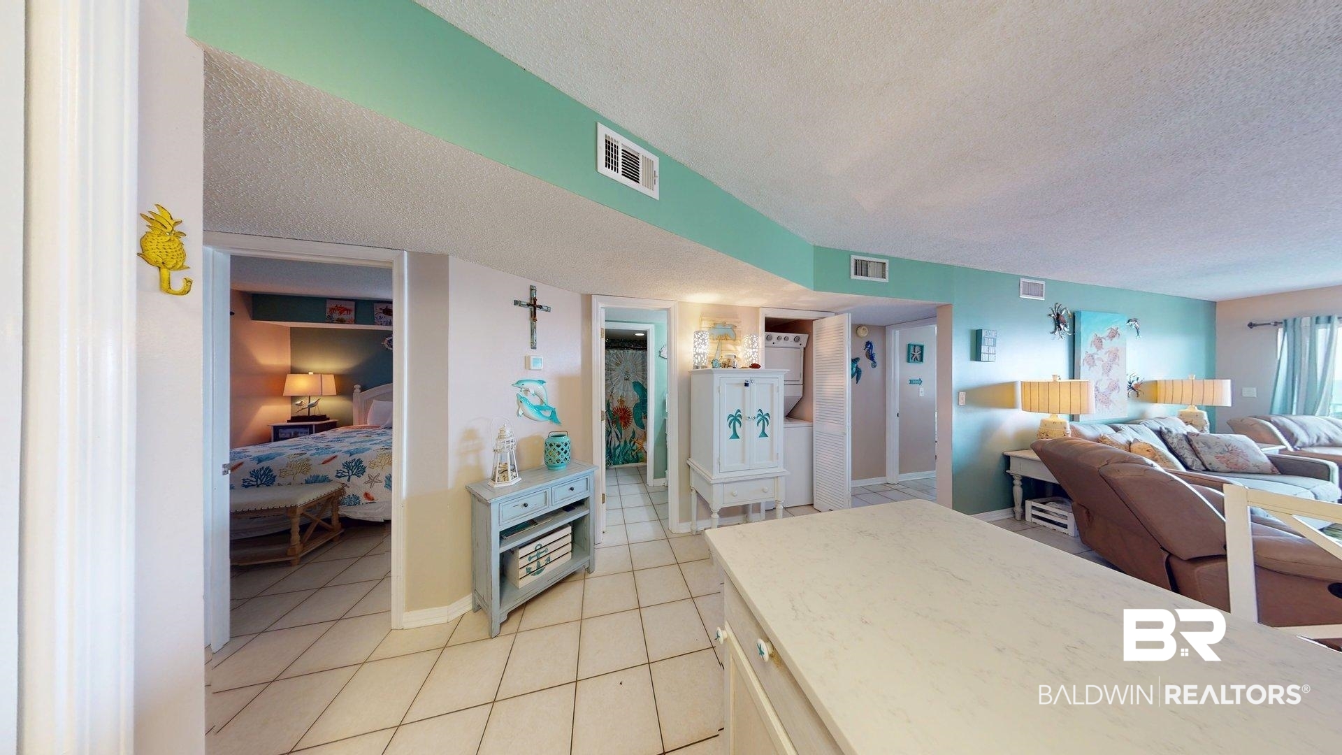 645 Plantation Road, Unit 6503 Gulf Shores, AL 36542 - Photo 52 of 53 Kitchen with a textured ceiling, light tile patterned flooring, and open floor plan
