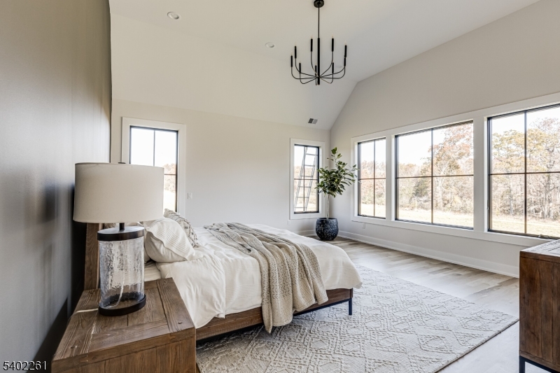 8 Juniper Pointe Trail Dunellen, NJ 08812 - Photo 12 of 37 a spacious bedroom with a bed and a window