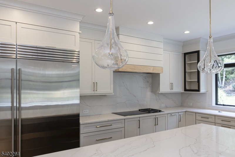 8 Juniper Pointe Trail Dunellen, NJ 08812 - Photo 14 of 37 a kitchen with stainless steel appliances granite countertop a stove and a refrigerator
