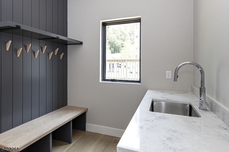 8 Juniper Pointe Trail Dunellen, NJ 08812 - Photo 27 of 37 a kitchen with a sink a table and chairs