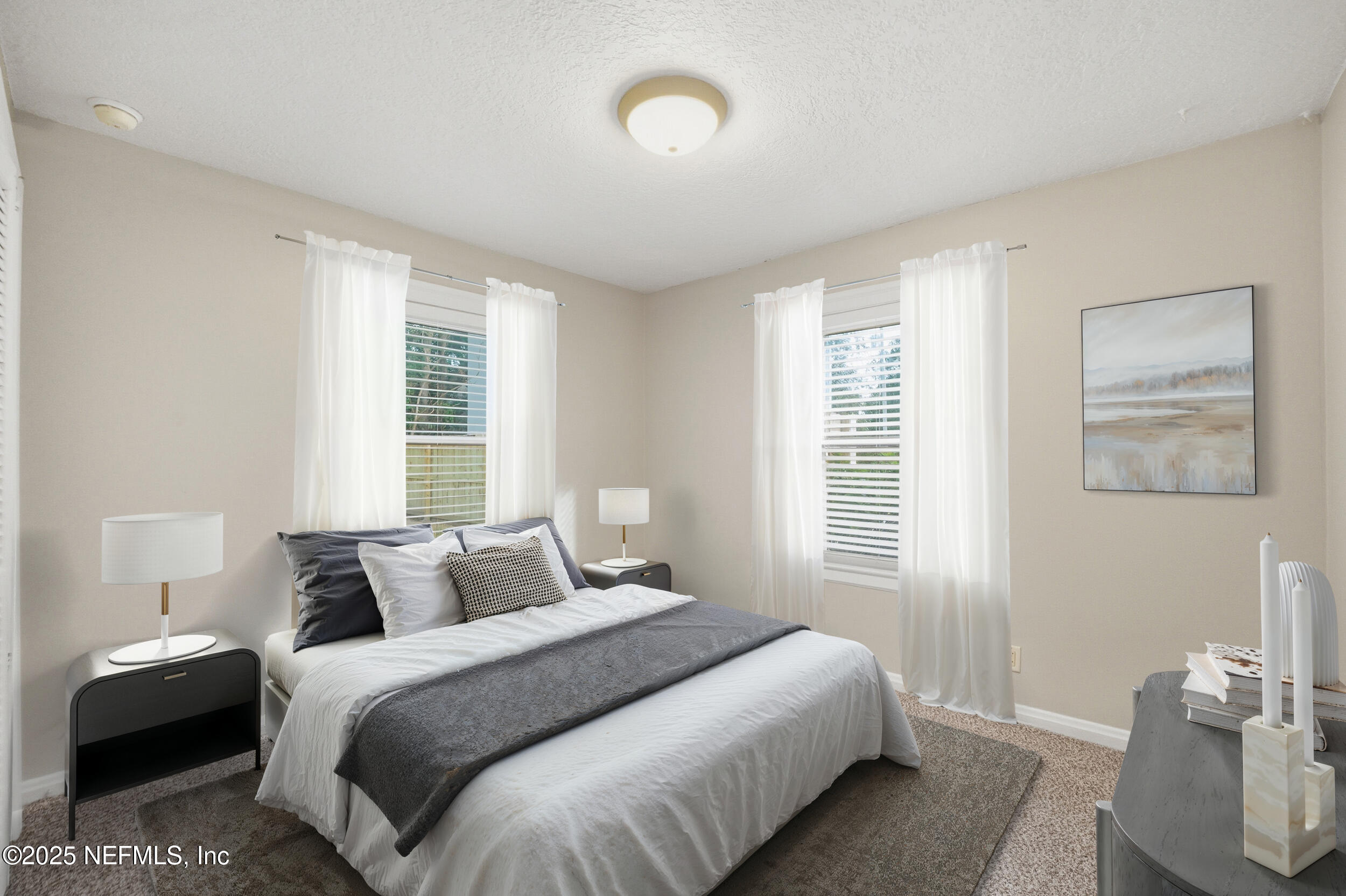 1211 Penman Road Jacksonville Beach, FL 32250 - Photo 22 of 44 a bedroom with a bed and a window