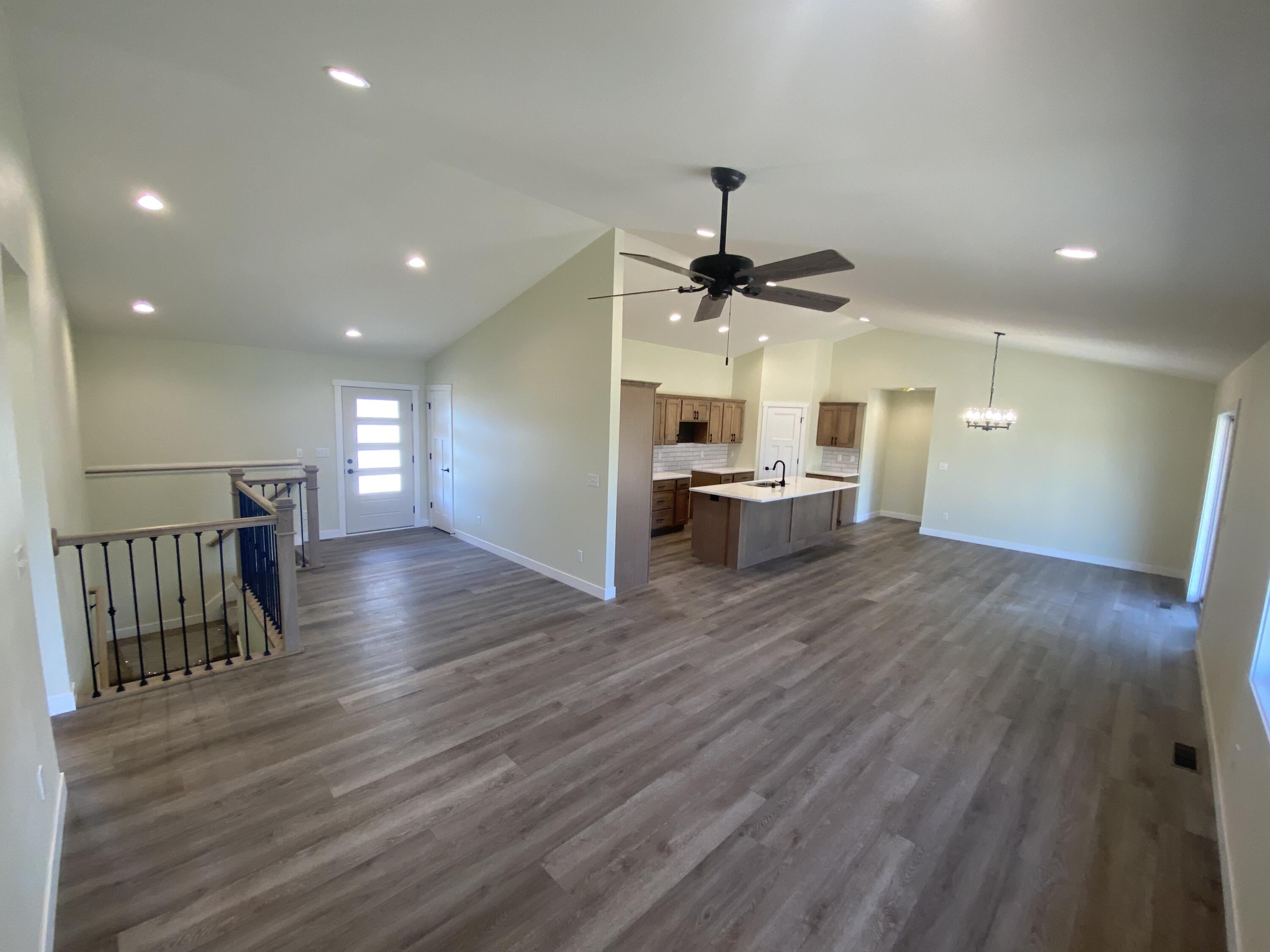 1957 Golden Gate Way Holmen, WI 54636 - Photo 12 of 62 Living area to entry and kitchen