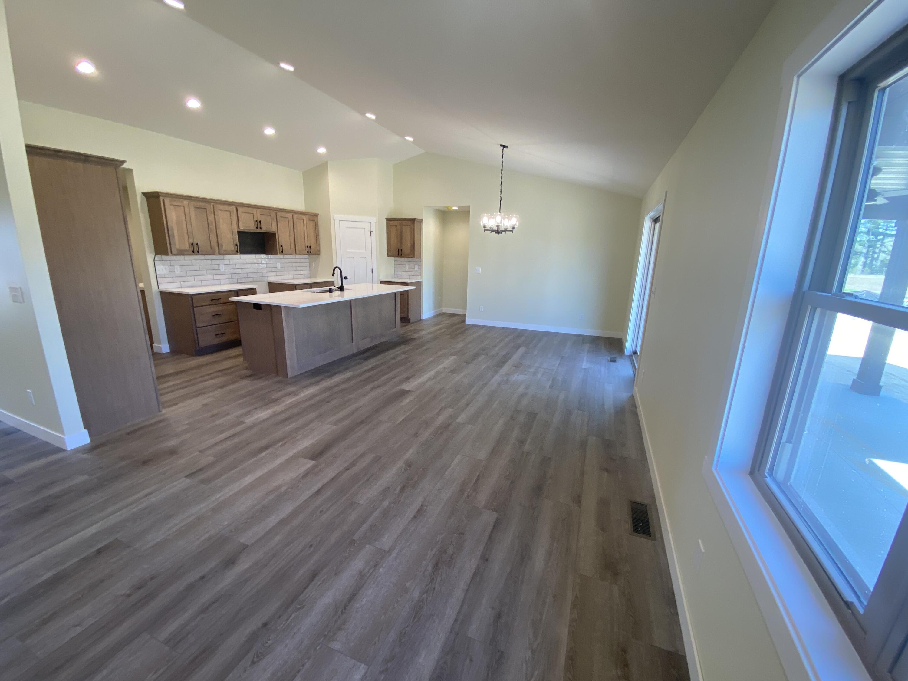 1957 Golden Gate Way Holmen, WI 54636 - Photo 13 of 62 Living area to kitchen