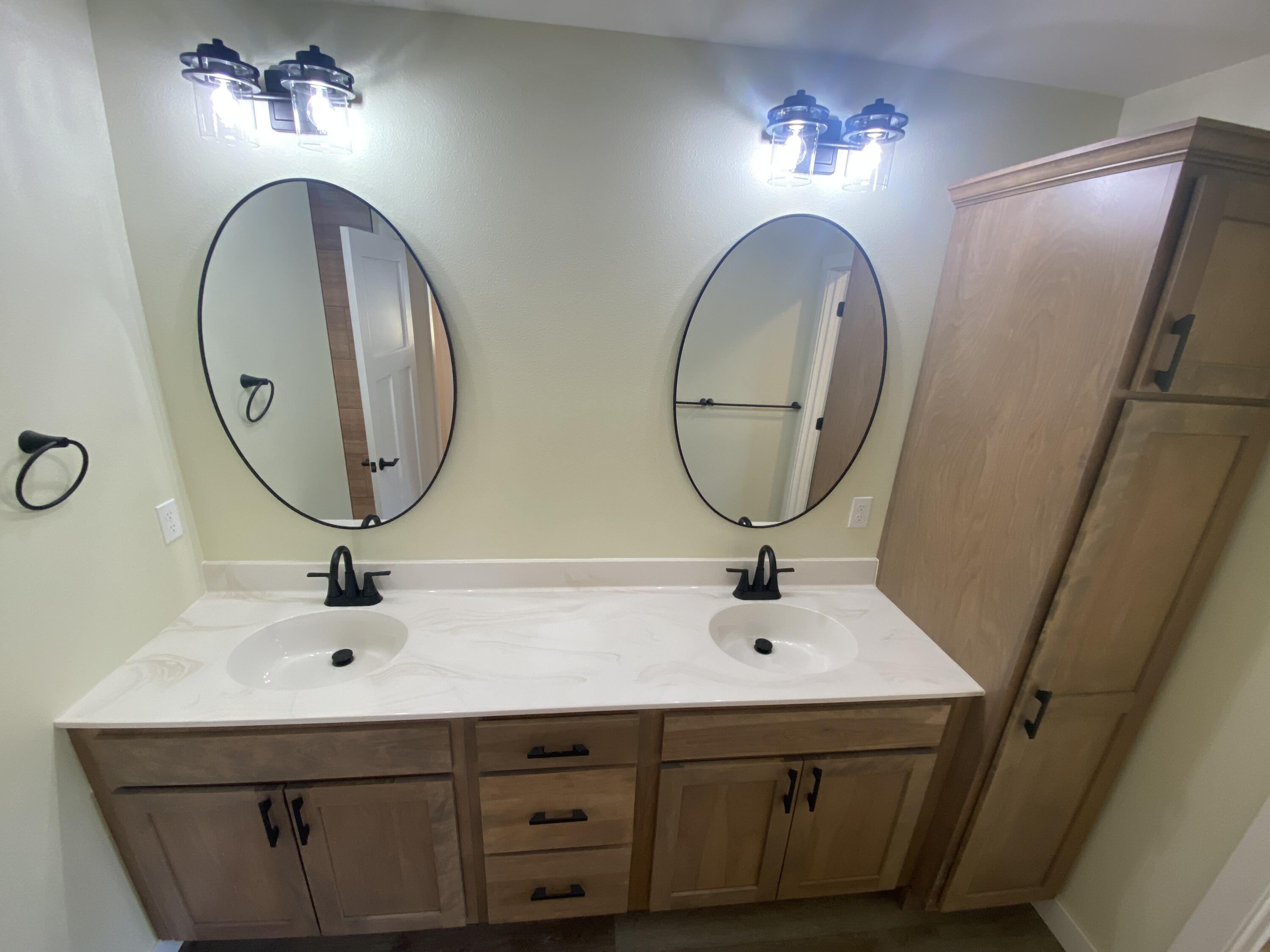 1957 Golden Gate Way Holmen, WI 54636 - Photo 45 of 62 Primary bath vantiy