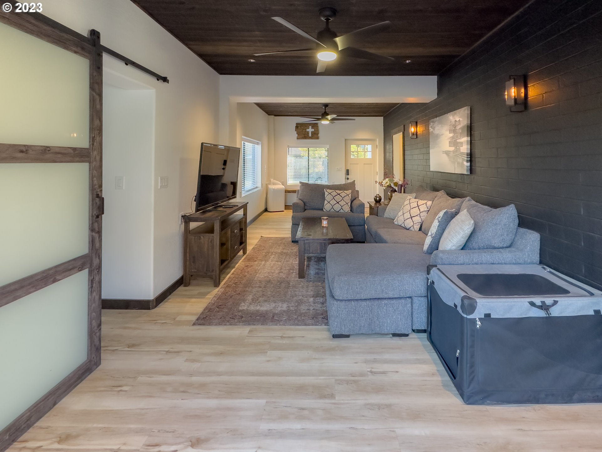 508 Edgewater Drive Grants Pass, OR 97527 - Photo 12 of 48 a living room with furniture and a flat screen tv