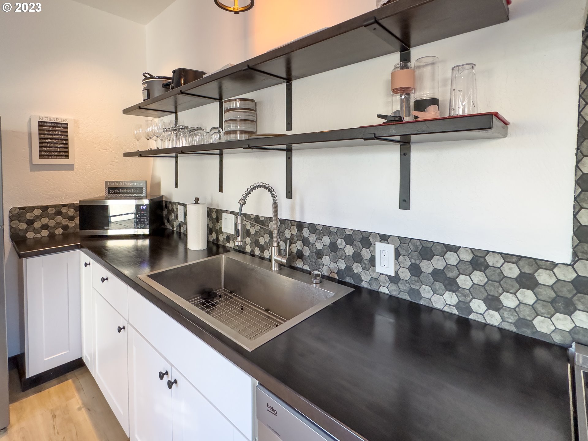 508 Edgewater Drive Grants Pass, OR 97527 - Photo 18 of 48 a kitchen with a sink and cabinets