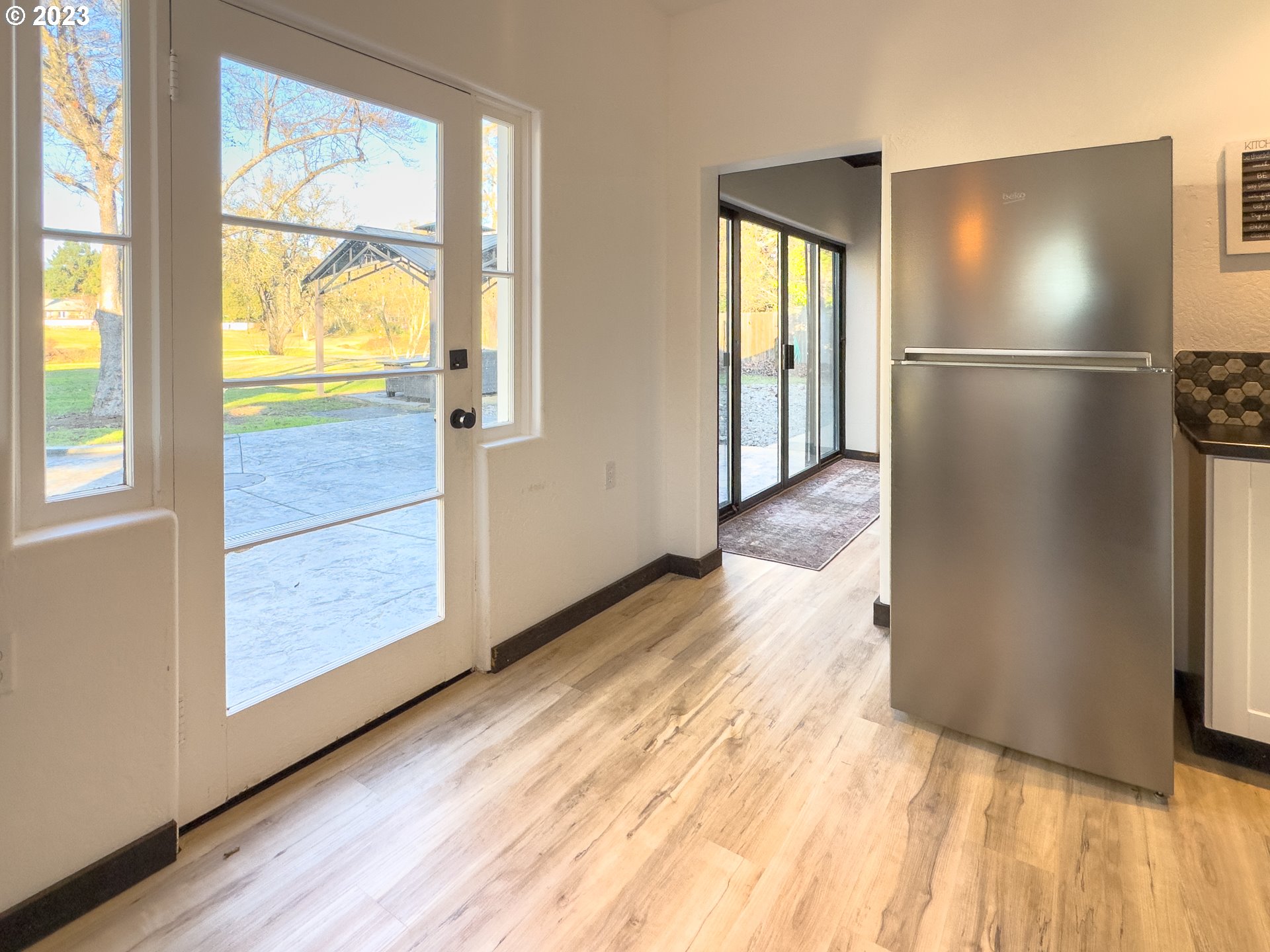 508 Edgewater Drive Grants Pass, OR 97527 - Photo 19 of 48 a view of an empty room with wooden floor and a window
