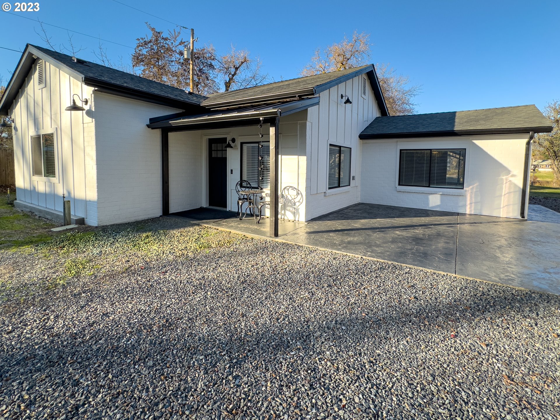508 Edgewater Drive Grants Pass, OR 97527 - Photo 9 of 48 a view of a house with a porch and furniture