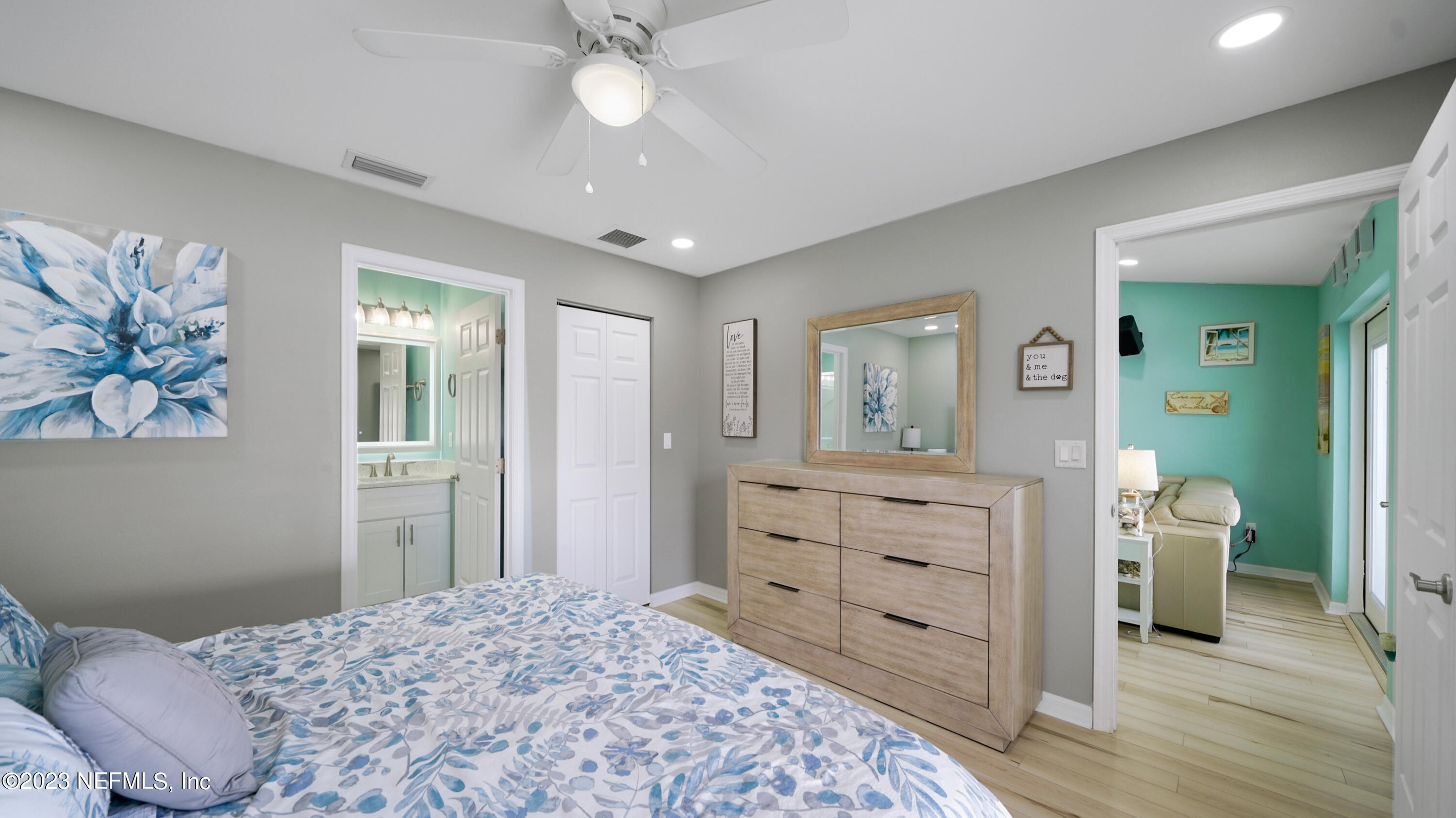 321 West Jayce Way St. Augustine, FL 32084 - Photo 15 of 34 a bedroom with a bed and a dresser