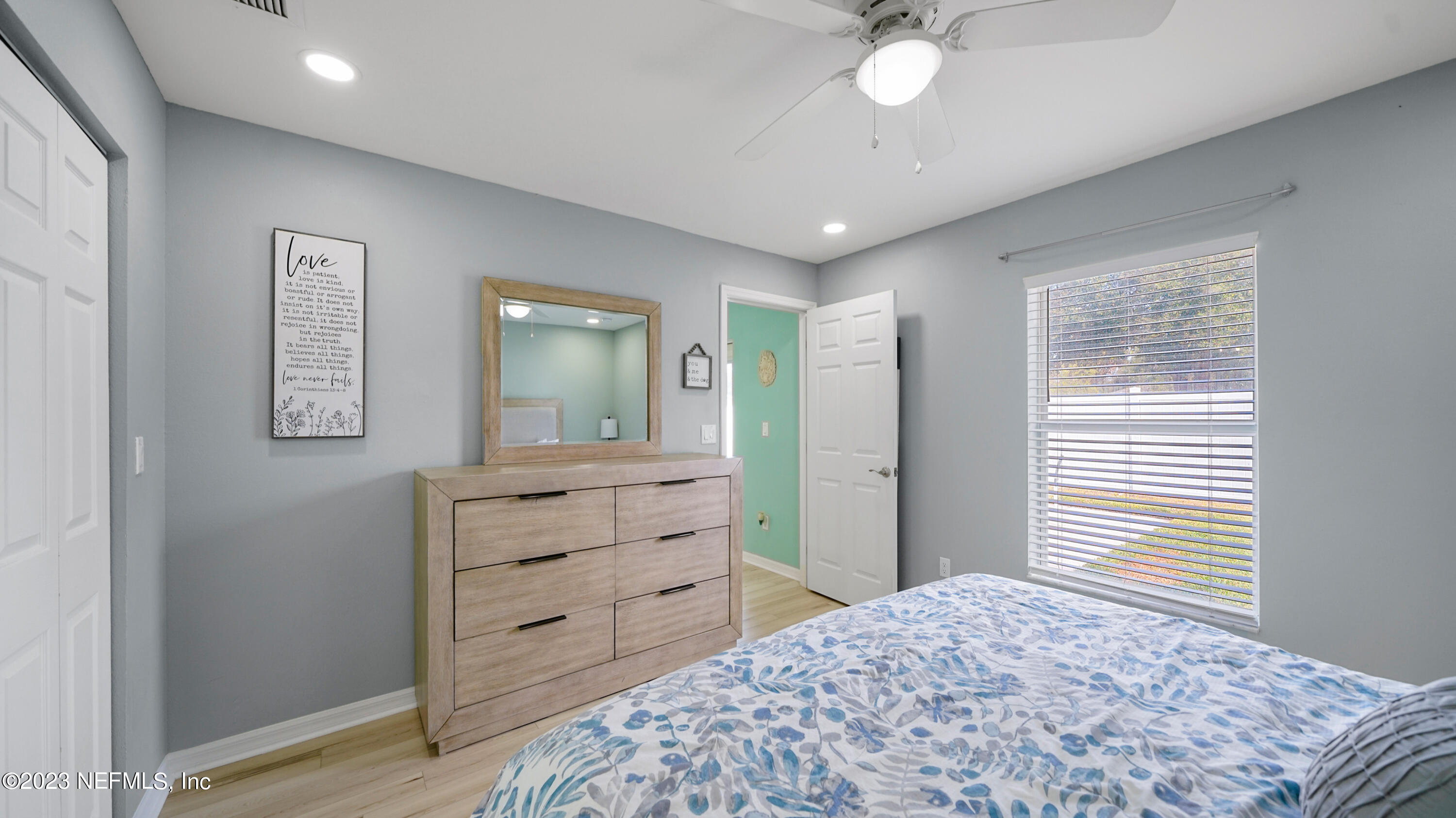 321 West Jayce Way St. Augustine, FL 32084 - Photo 16 of 34 a bedroom with a bed and a dresser