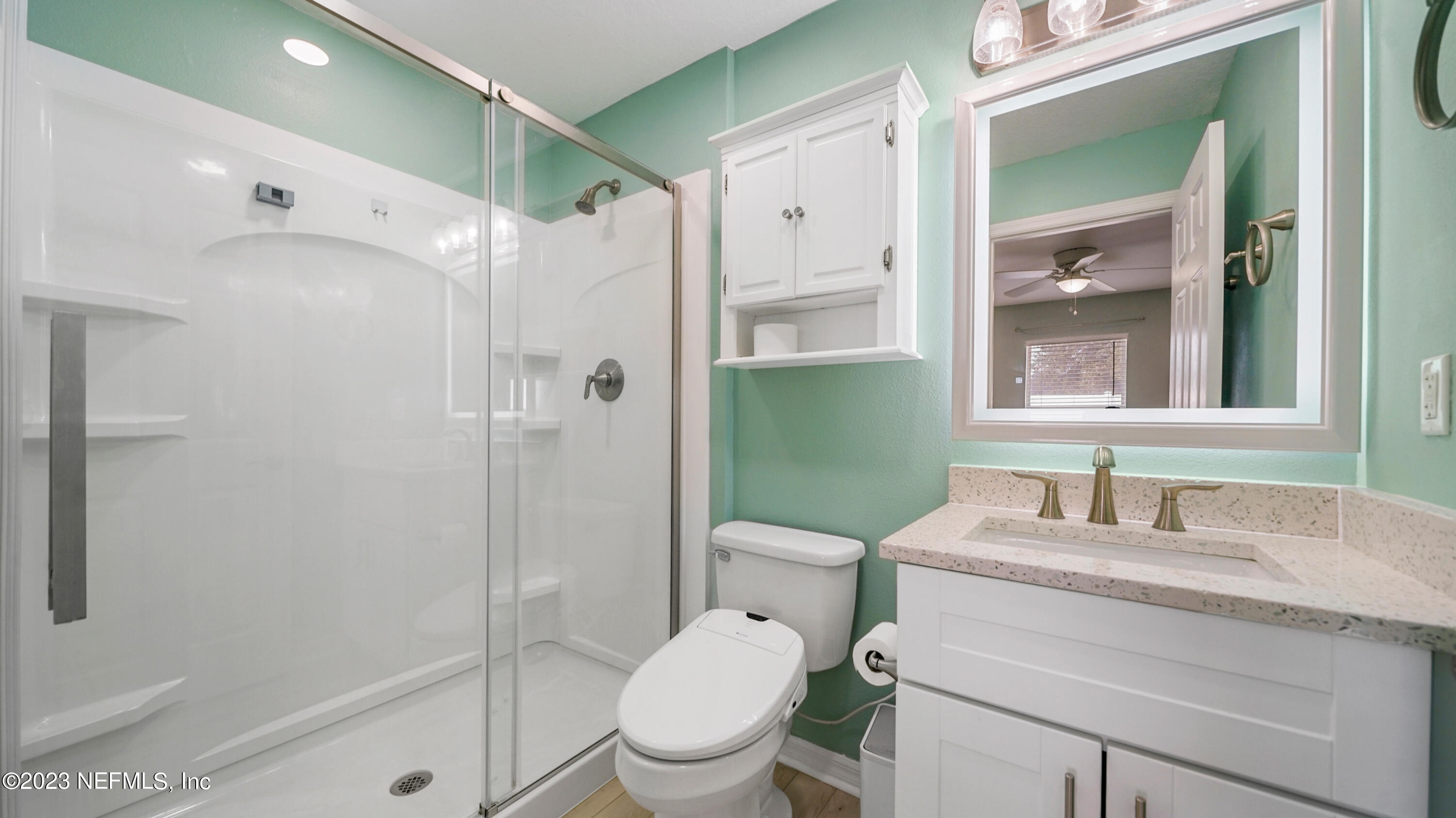 321 West Jayce Way St. Augustine, FL 32084 - Photo 17 of 34 a bathroom with a sink toilet and shower