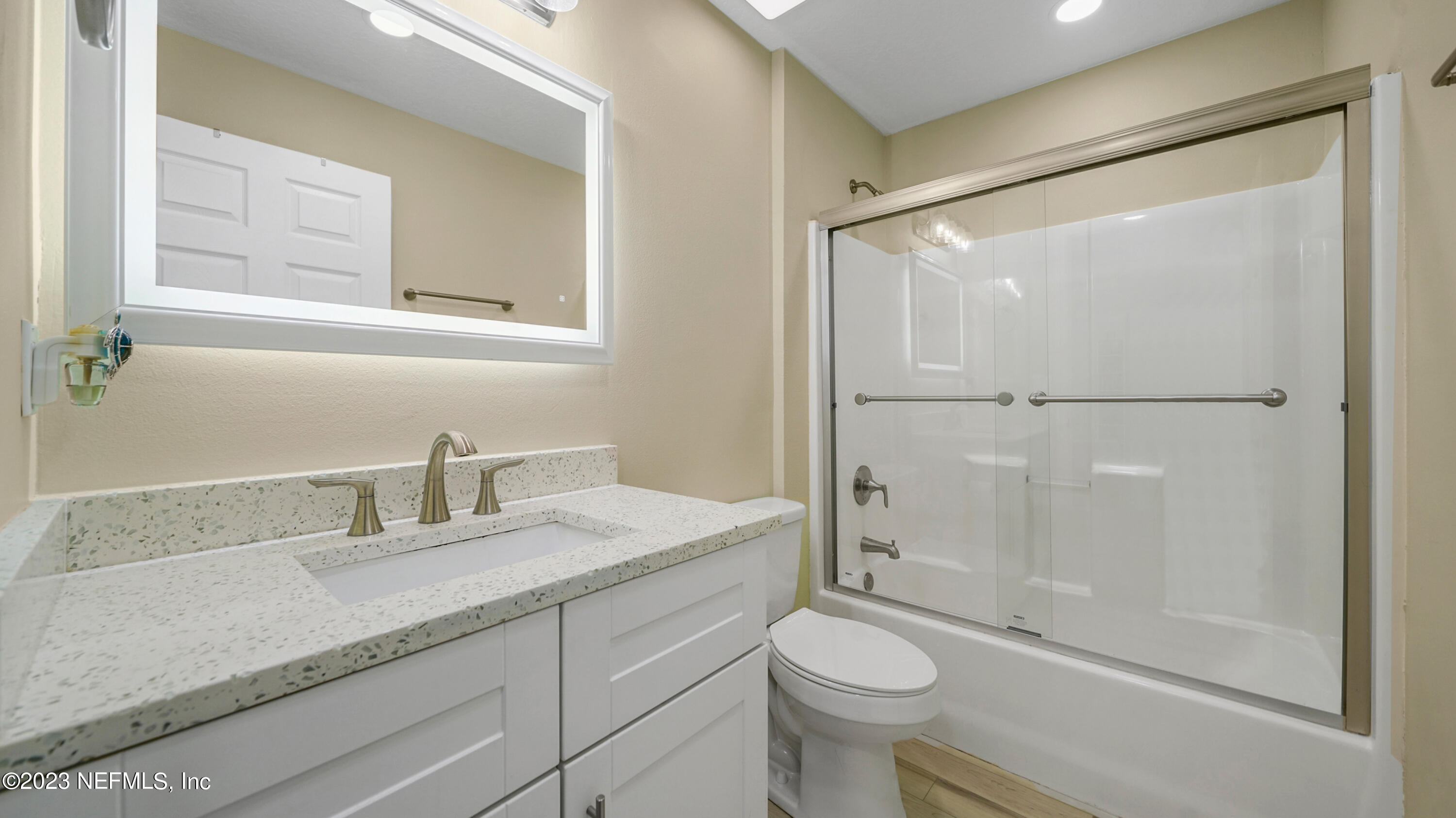 321 West Jayce Way St. Augustine, FL 32084 - Photo 20 of 34 a bathroom with a granite countertop sink toilet and shower